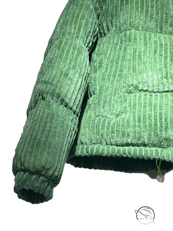 Cozy green corduroy cotton coat with plush ribbed texture and quilted panels