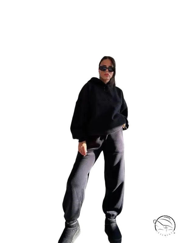 Woman in casual comfy sweaters two-piece winter solid color set in minimalist space