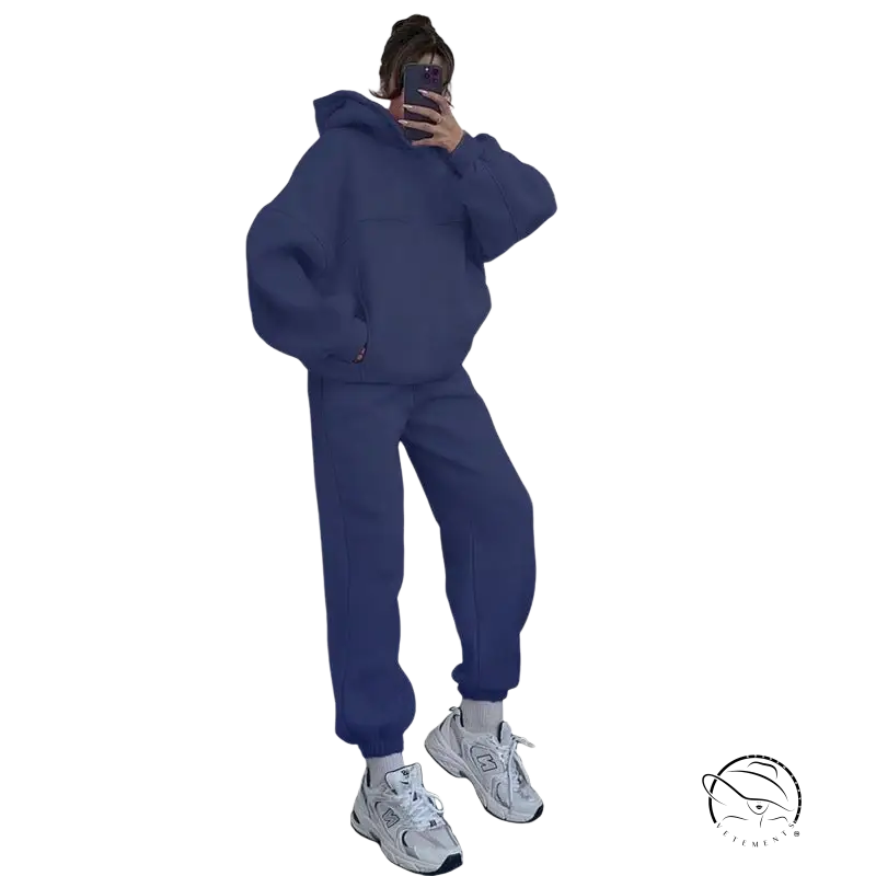 Person in navy blue casual comfy sweaters two piece taking mirror selfie