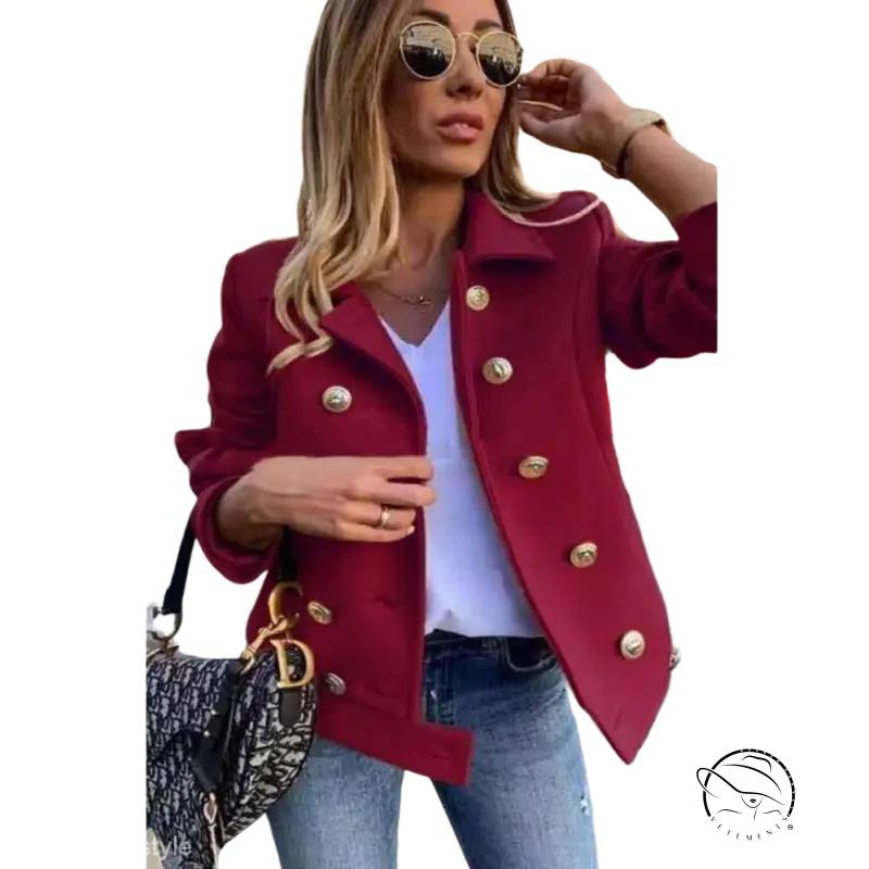 Burgundy double breasted jacket with gold buttons over white top and jeans