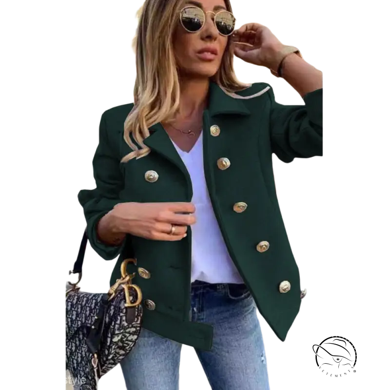 Green double breasted jacket with gold buttons over white top and jeans