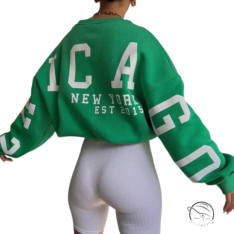 Green knitted graphic printed hoodie with white lettering