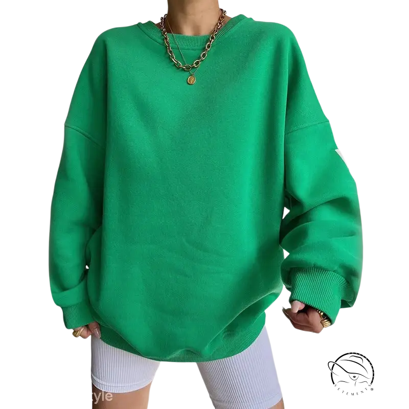 Oversized knitted graphic printed hoodie with gold necklaces