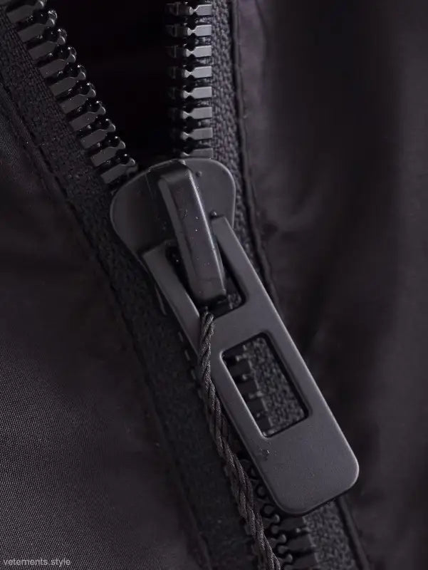 Black zipper pull on a Casual Loose Cotton Short Jacket for Autumn Winter Wear