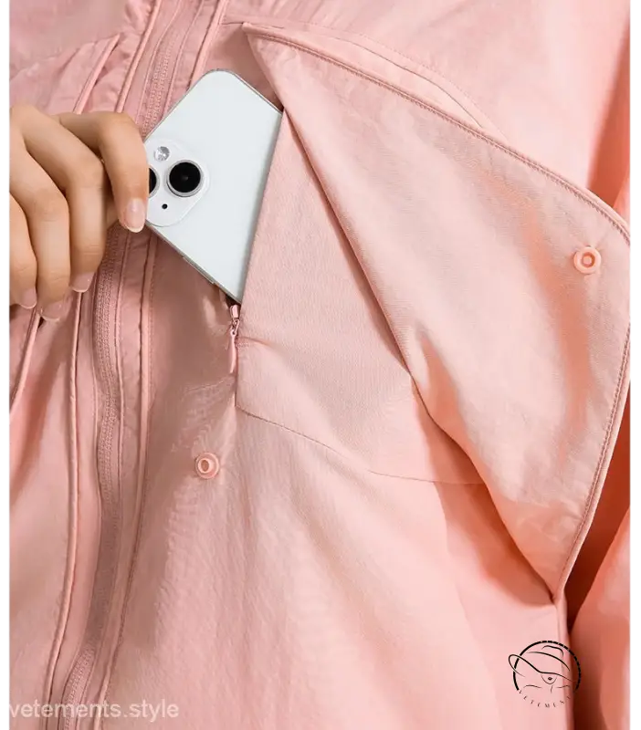Casual loose nylon outerwear in pearlescent white albumin with pink jacket and phone in pocket