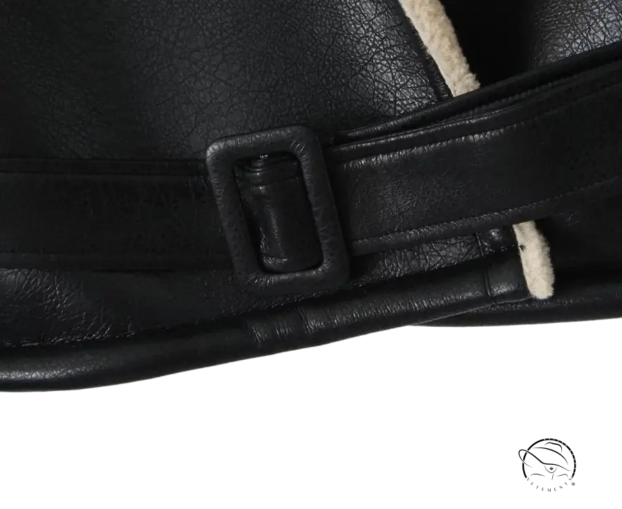 Black leather strap with cream lining on casual modern faux shearling jacket