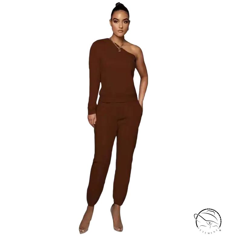 Brown one-shoulder sweater set with long sleeves and tapered trousers