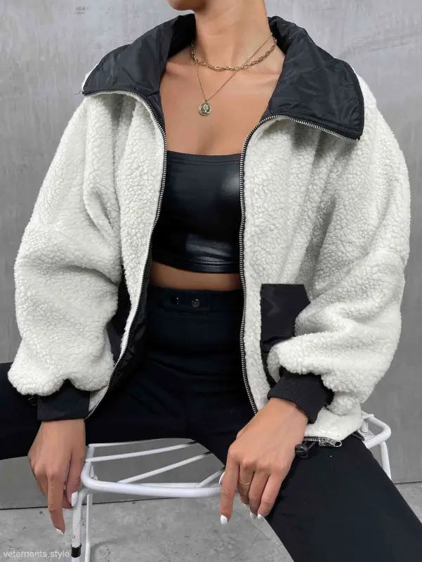 Fluffy white and black urban knitted jacket with contrasting collar for autumn winter comfort
