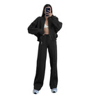 Woman wearing a black Zipper Cardigan Sweater with Casual Straight Pants for Spring/Fall