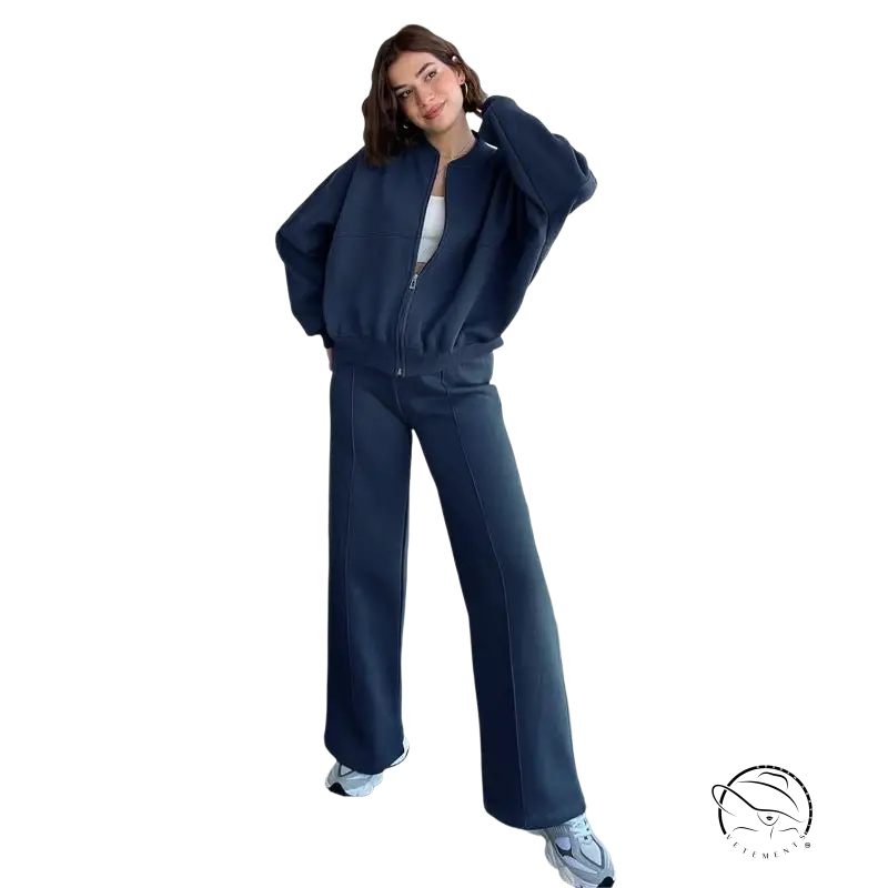 Woman in navy blue zipper cardigan sweater set with casual straight pants