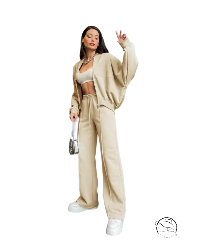 Woman in beige cardigan sweater set with casual straight pants