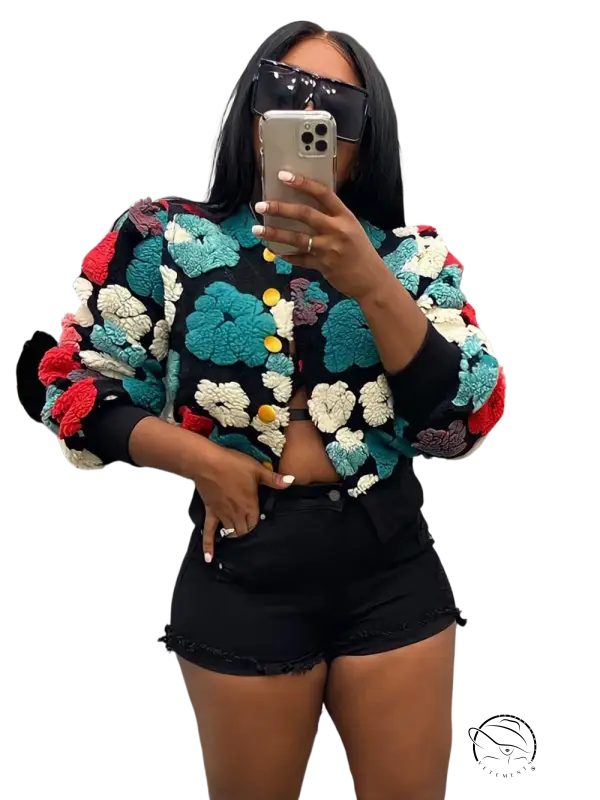 Rose red chrysanthemum floral print jacket with pom-pom sweater and black shorts