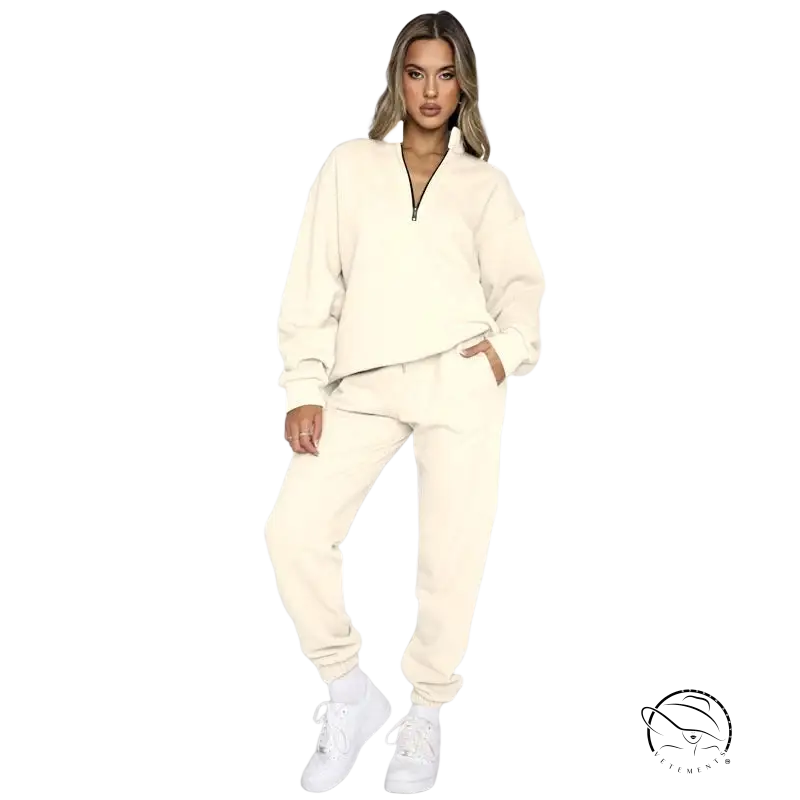 Cream-colored comfy cool pullover and smart trousers suit with half-zip top