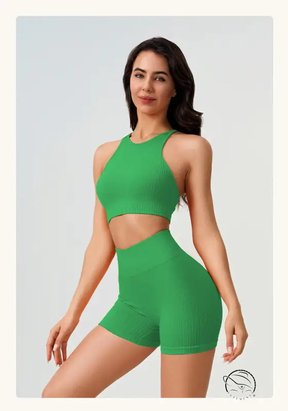 Woman in comfy high waist yoga shorts in peach blossom pink