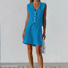 Blue vest and shorts set styled with Dark Green Faux Linen summer top for casual office wear