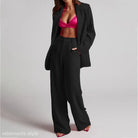 Black pantsuit with pink top featured in Edith Elegant Set Spring Elegant Collared ensemble