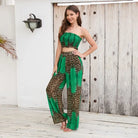 Woman in green and leopard print two-piece outfit, elegant animal print style for summer