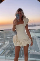 Woman modeling Elegant Asymmetric Ruffled Summer Dress with One Shoulder Sleeve