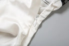 Elegant Backless Lace Split Dress featuring a white satin garment with zipper detail