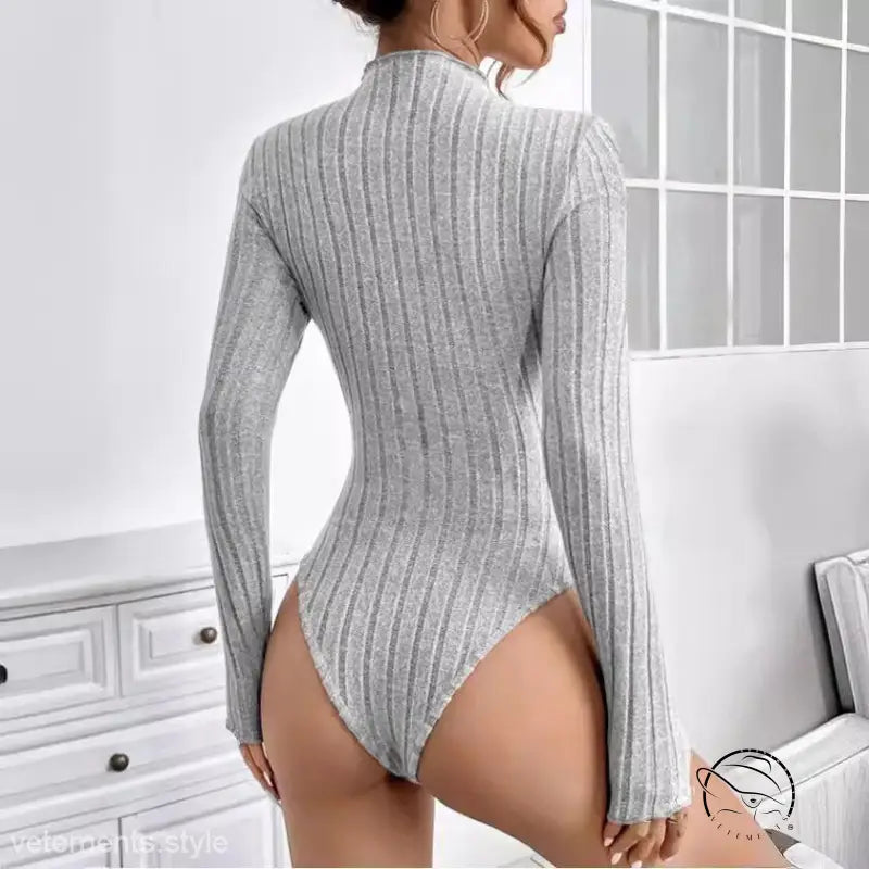 Gray ribbed long-sleeved brushed striped jumpsuit worn by a woman for Spring and Fall wear