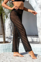 Black crochet summer beach pants with lace and tulle accents for stylish beach wear
