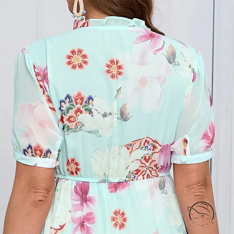 Elegant evening maxi dress in light blue floral chiffon with ruffles