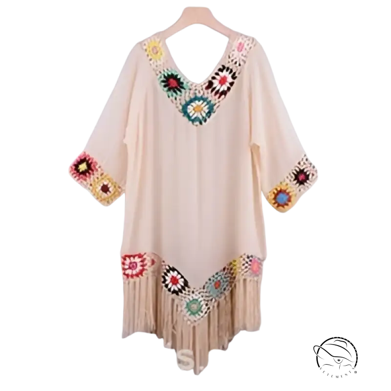 Cream-colored bohemian comfy beachwear dress with crochet details and fringe trim