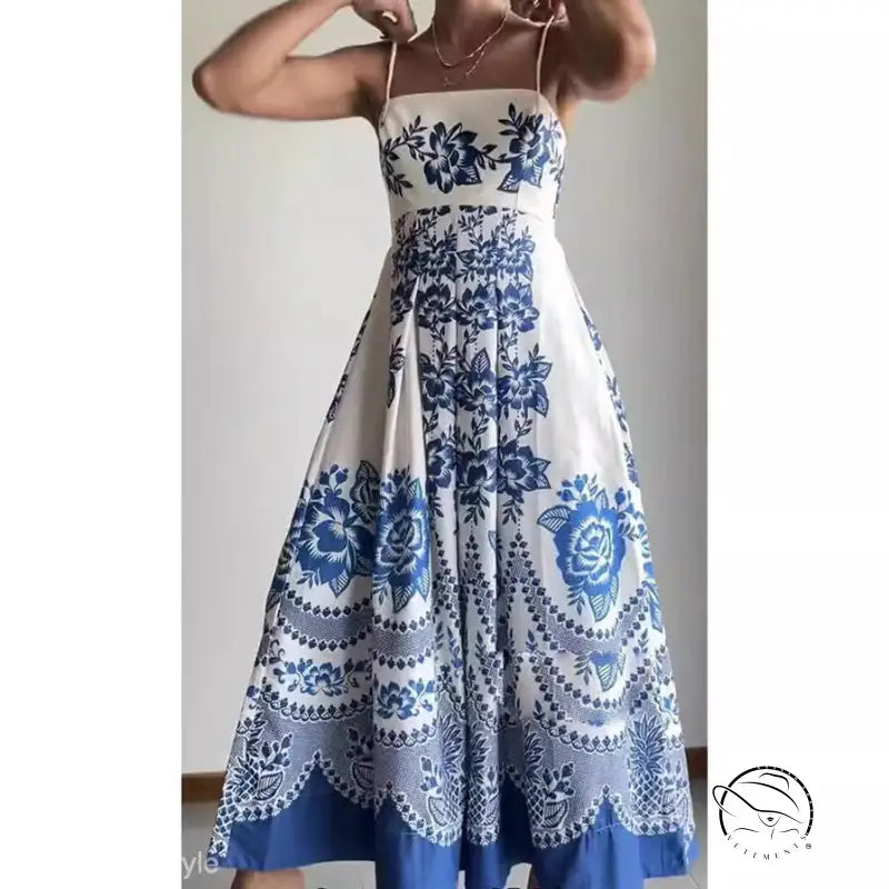 Elegant white floral maxi summer dress with spaghetti straps