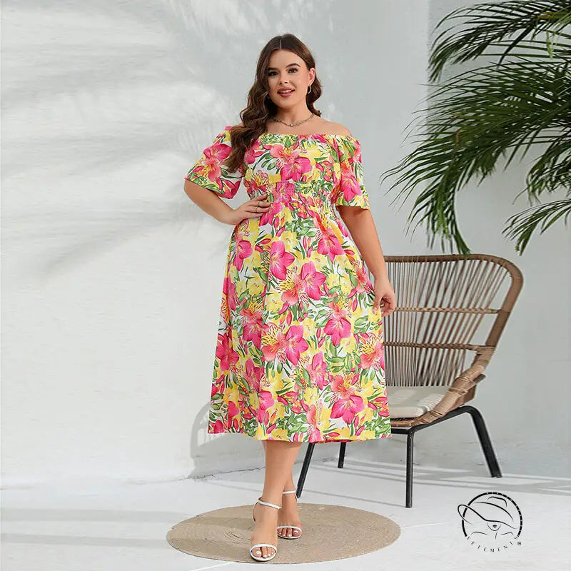 Elegant floral midi dress with vibrant pink, yellow, green print