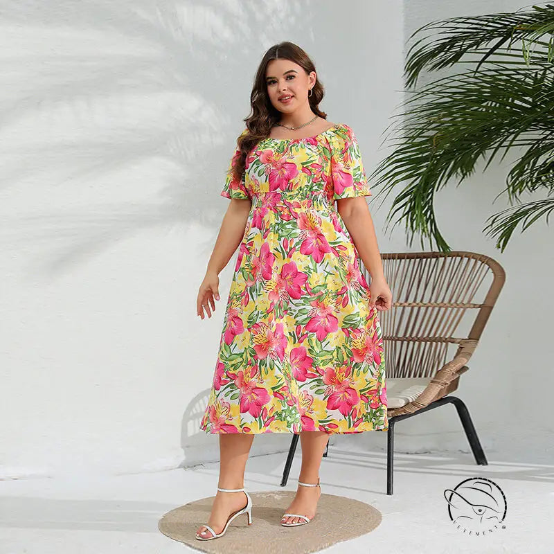 Elegant floral midi dress with short sleeves and shirred waist