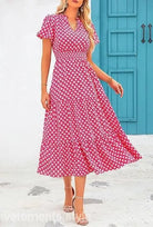 Pink and white floral midi dress with v-neckline, perfect bubble pleated dress for any occasion