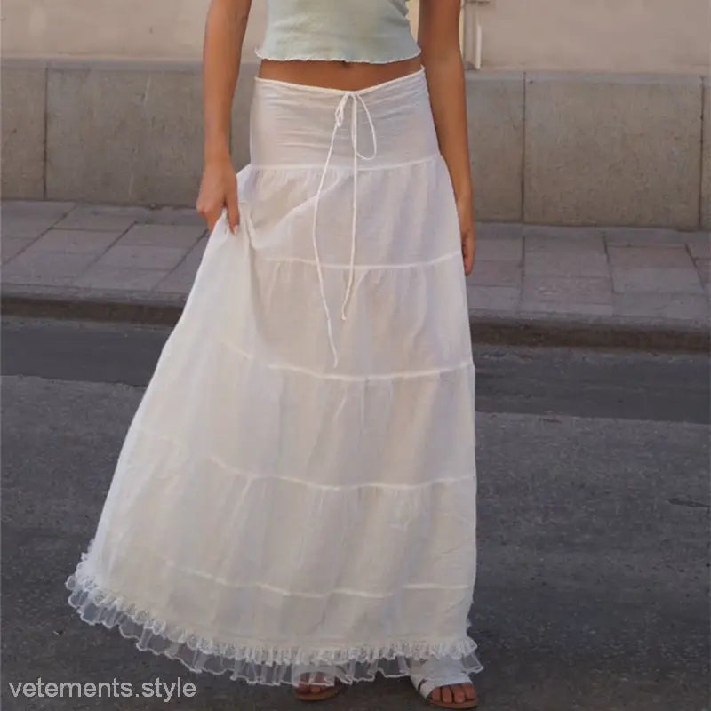 White tiered maxi skirt paired with Elegant French Collar Top featuring lace stitching
