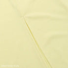 Thin diagonal line on a pale background of an Elegant Girdle Dress with Lace Accents