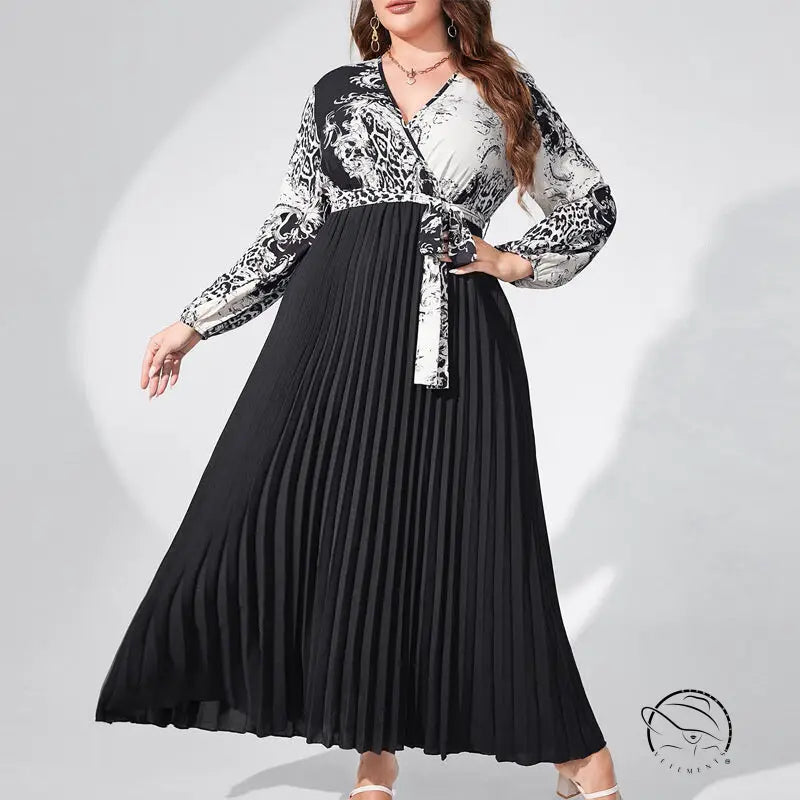 Elegant high waist maxi dress with belted V-neck, lantern sleeves, black pleated skirt, and patterned bodice