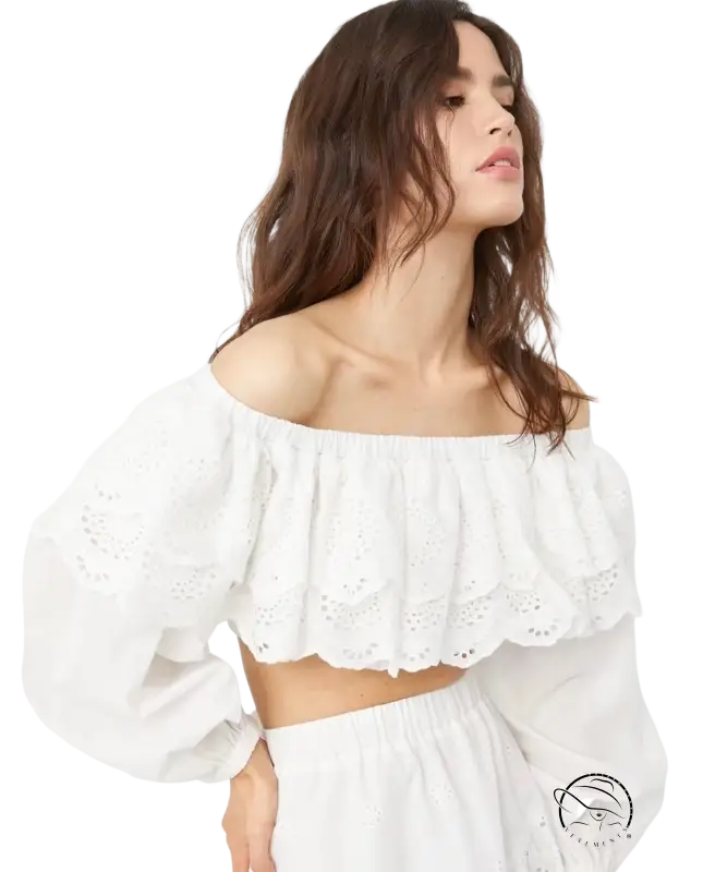 Woman in jacquard ultra short high waist crop top with eyelet lace trim