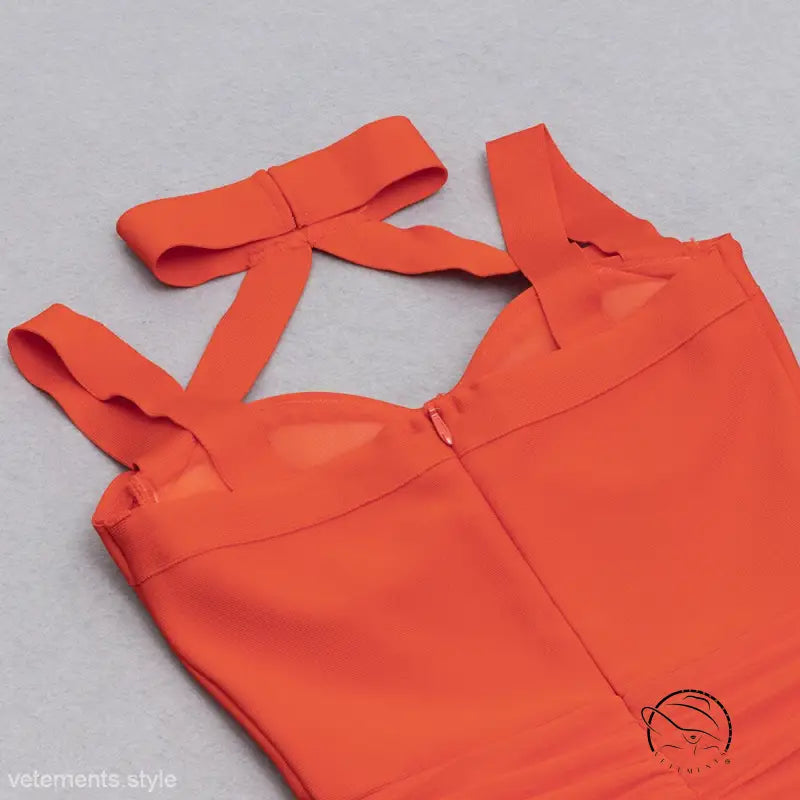 Elegant light blue bandage dress with neon orange swimsuit cutouts