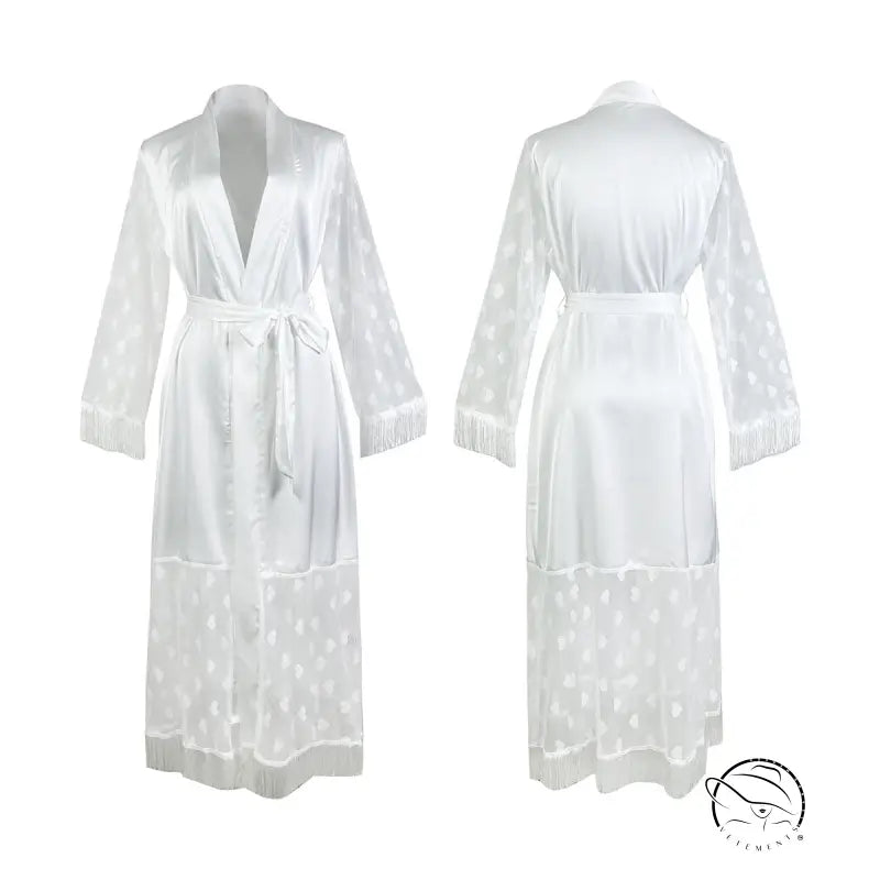 White, long-sleeved robe with a tie waist and sheer polka dot pattern on the lower half.