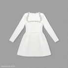 Elegant long sleeve stretch dress featuring a fitted waist and rhinestone square neckline