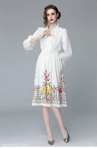 Elegant floral-print dress from a long sleeve two piece set inspired by French countryside style