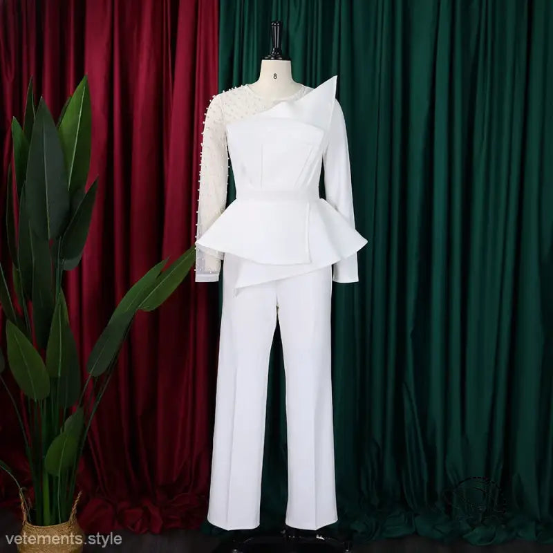 Elegant white mesh beaded jumpsuit with peplum detail