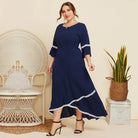 Navy blue maxi dress with white trim and flared sleeves.