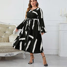 Elegant Neckline Flared Dress with Graffiti Cutout and Belted V-neck