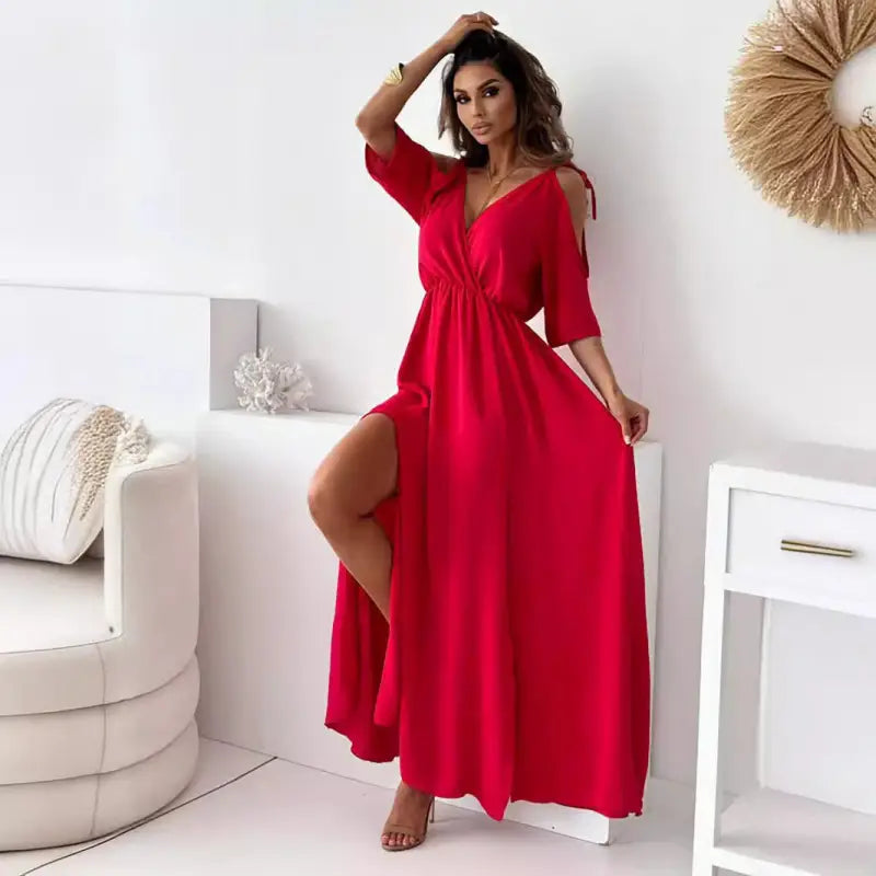 Elegant rose red sling mid length dress with thigh-high slit and cutout details