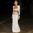 White two-piece evening ensemble with cropped blazer and floor-length skirt, stretch bandage dress