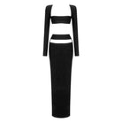 Black long-sleeved crop top and maxi skirt set featuring white cutout details
