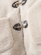 Fluffy white coat with toggle closures, ideal as an Elegant Ornament Fleece Jacket