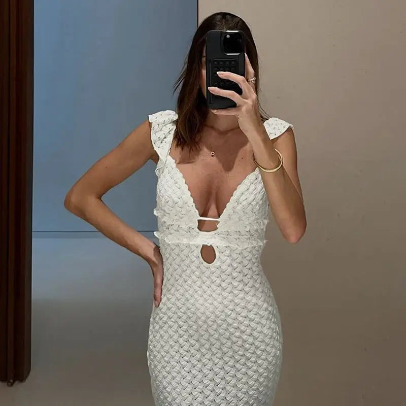 White textured elegant slim fit evening dress featuring a plunging backless V-neck design