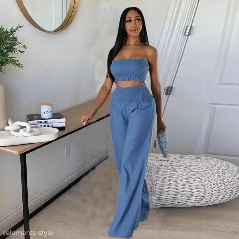 Blue two-piece pants suit featuring ruffle and smocked strapless design, perfect slim pants suit