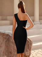 Woman in a sleek black one-shoulder bodycon dress promoting elegant white dress with free shipping