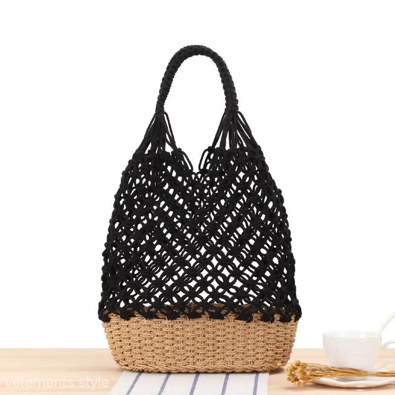 Woven handbag featuring a black crochet top and tan wicker bottom for handmade elegance